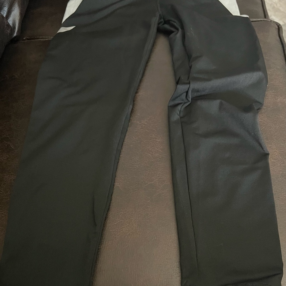 Black leggings with design on the sides size Large